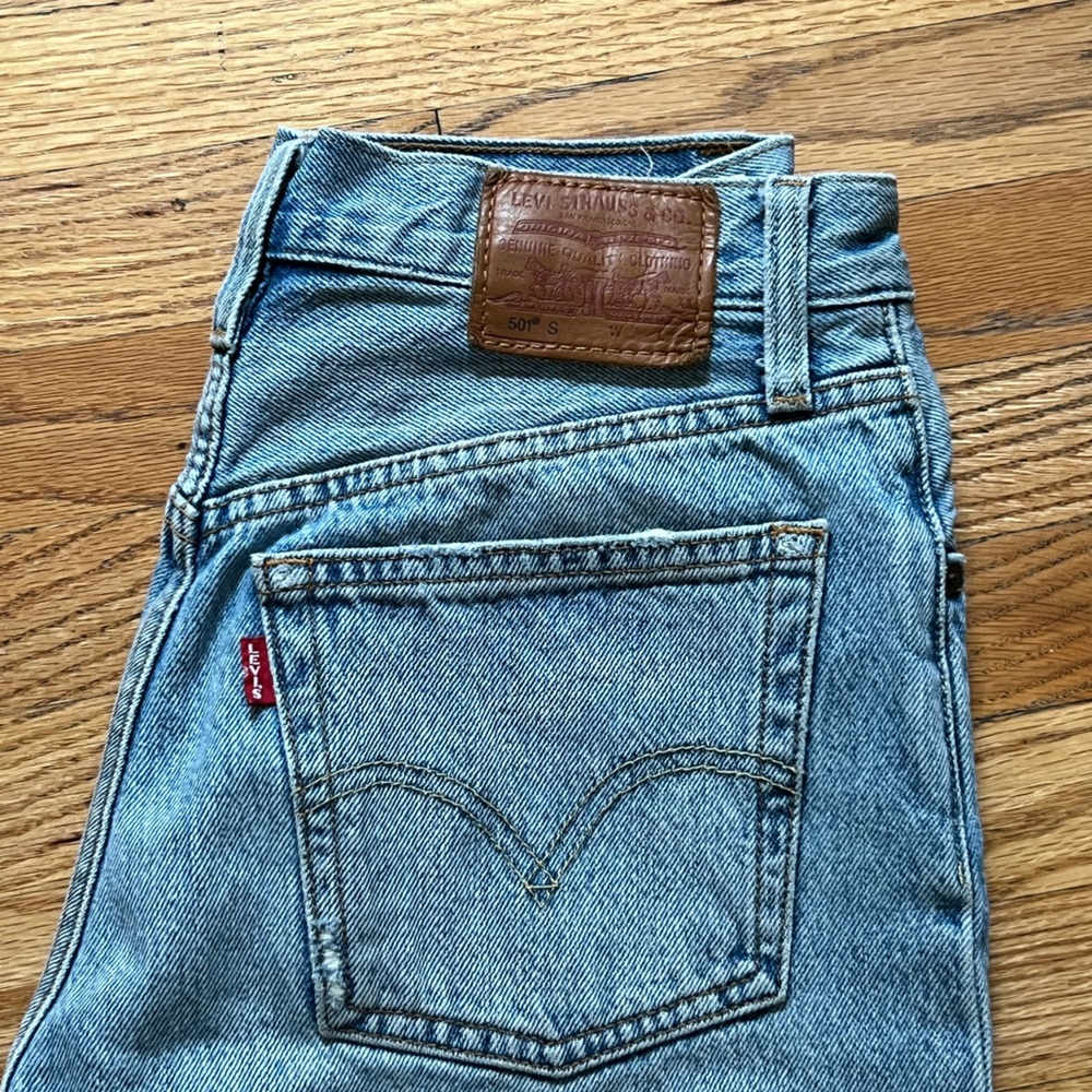 Levi 501 ripped jeans